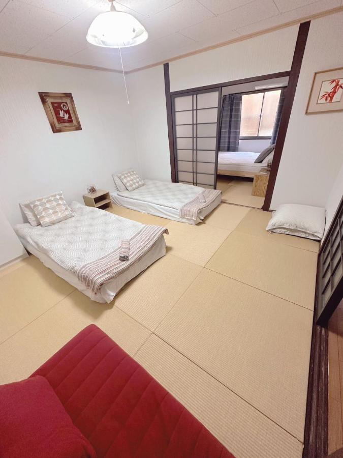 Nippori Osaka Nishi-Tengachaya Guesthouse西天下茶屋アパートメント Buitenkant foto
