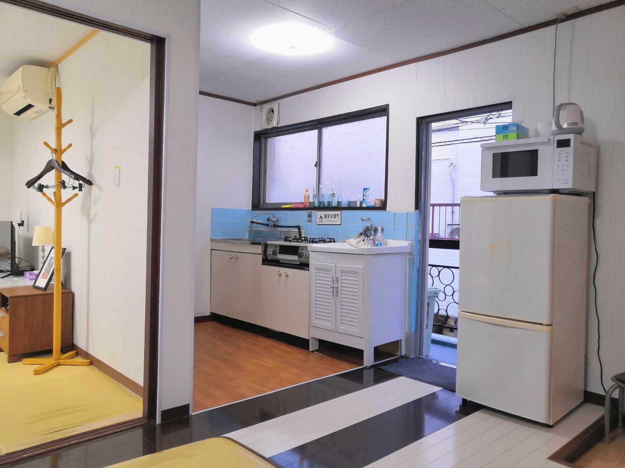 Nippori Osaka Nishi-Tengachaya Guesthouse西天下茶屋アパートメント Buitenkant foto